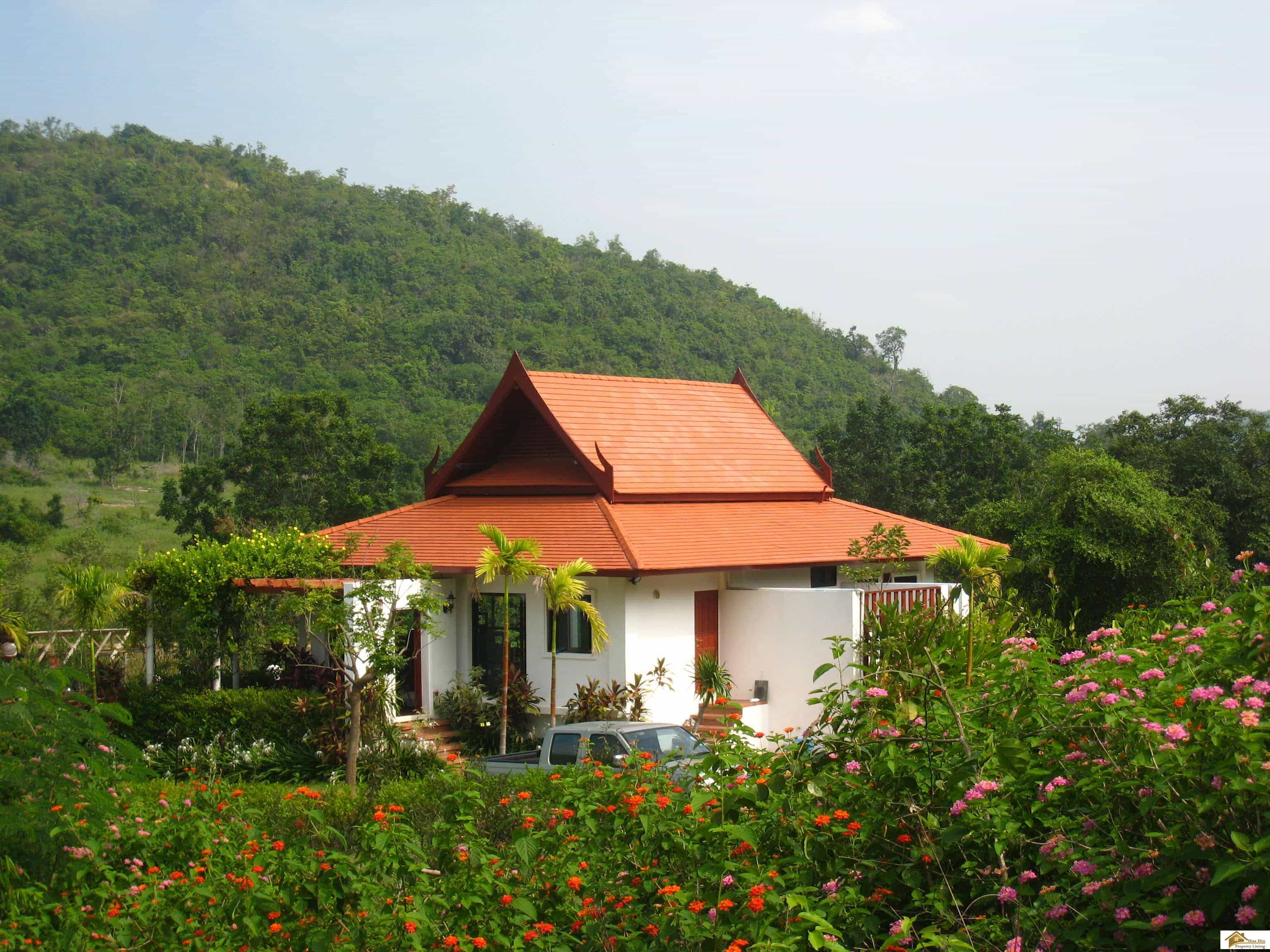 Charming Thai Style Villa Amidst Serene Mountain Scenery